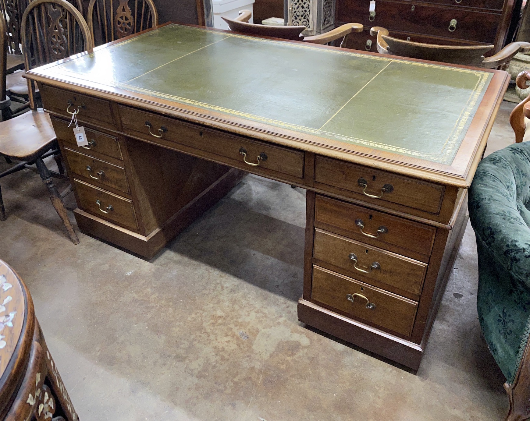 An early 20th century mahogany pedestal desk, length 152cm, depth 81cm, height 75cm